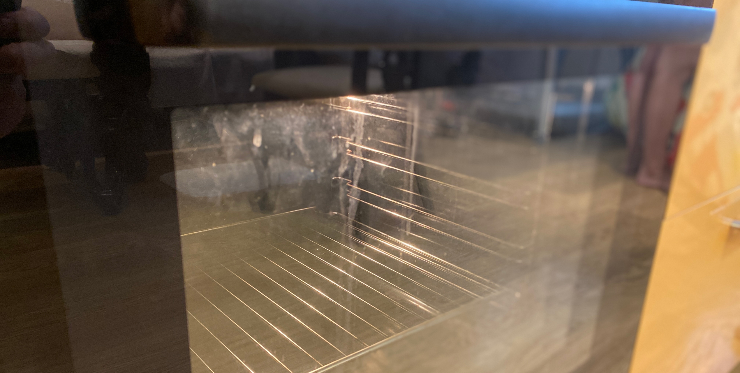 Cleaning between oven glass layers